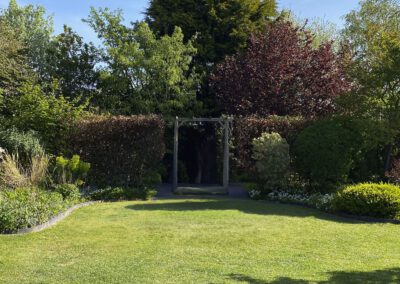 Garden maintenance in Weston On Trent with trimmed lawn, tidy edging and maintained planting beds