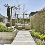 Landscaping in Chellaston with sleeper raised beds, fresh turf, planting and garden lighting