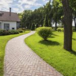Paved pathway through landscaped garden in Leicester