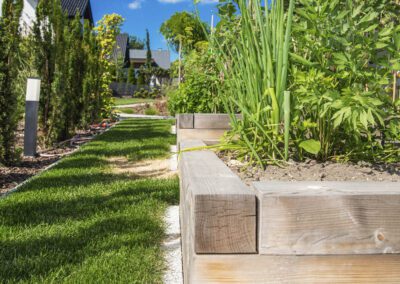 Landscaping in Chellaston with sleeper raised beds, fresh turf, planting and garden lighting