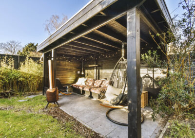 Back garden in Darley Abbey with a modern wooden gazebo and cozy seating area.