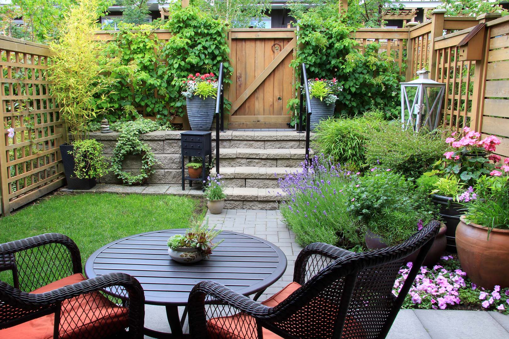 Garden maintenance in Repton with maintained borders, tidy planting and a neat seating area